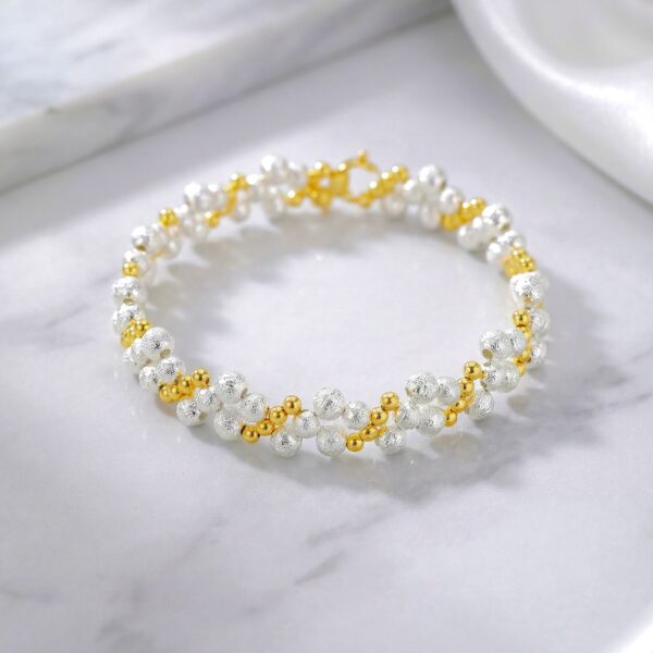 Pulsera Dorada con Plateado en Rodio ZPUC01-16