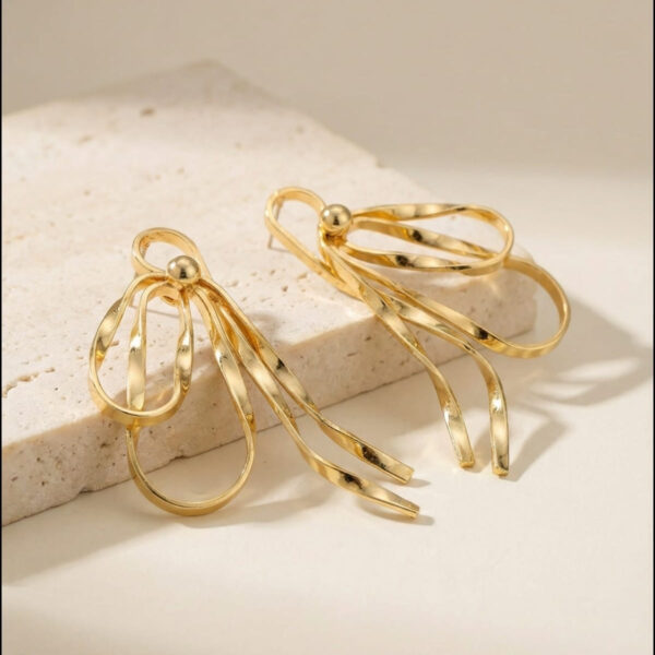 Aretes dorados Celeste