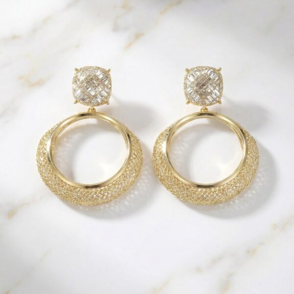 Aretes dorados Élite