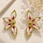 Aretes CÃ©lia de ZYRAL en color fucsia y morado