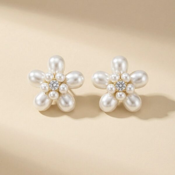 Aretes dorados Con Blanco Ícono