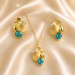 Set de collar y aretes dorados Magnolia